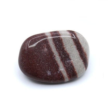Cristal natural Lingam Tumble para energía y bienestar