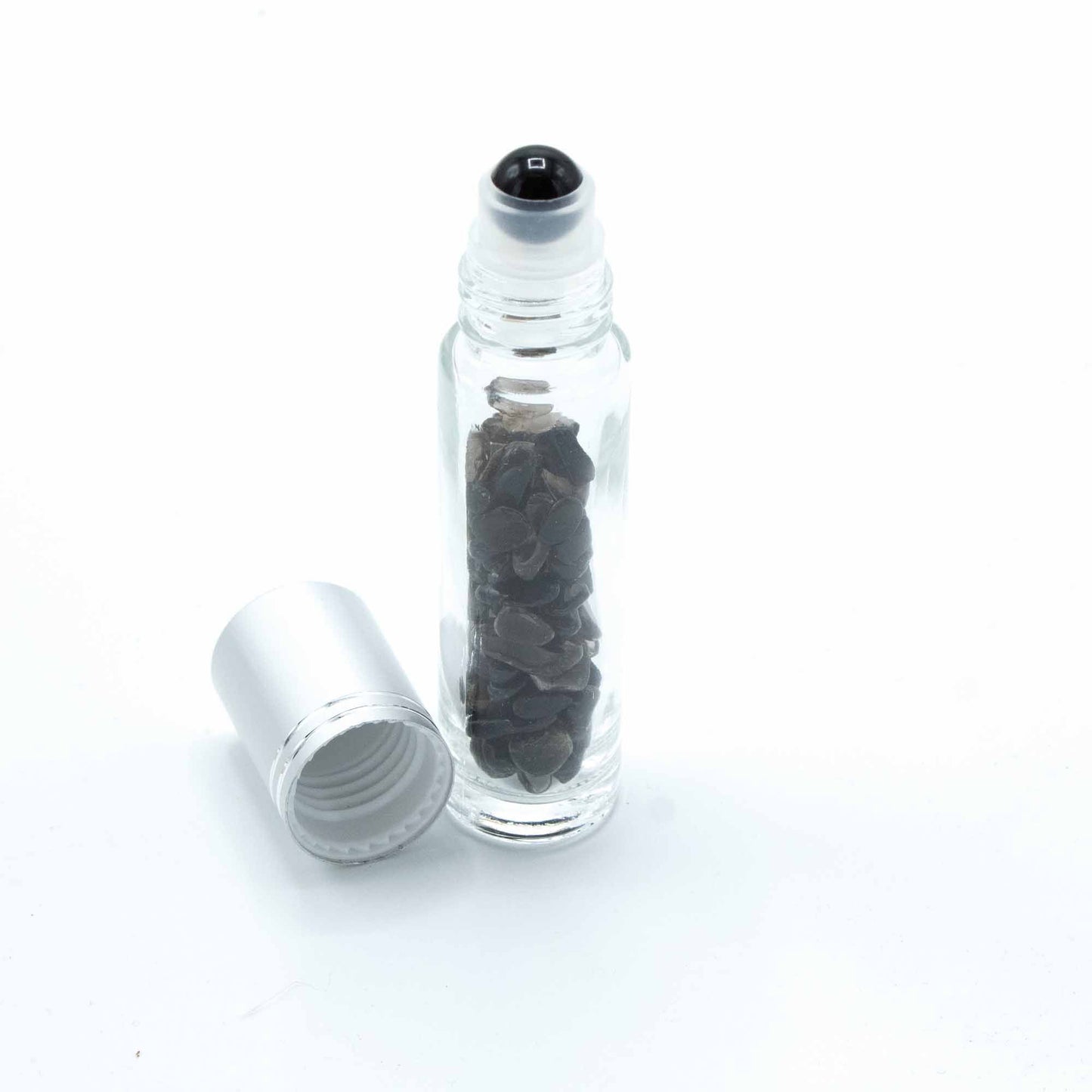 Botella Roll-On con Turmalina Negra – Aceite Esencial de Protección Energética (Chakra Raíz)