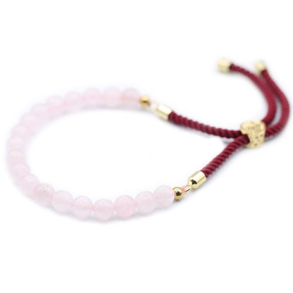 Pulsera de hilo burdeo con Cuarzo Rosa